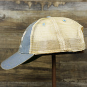 The wearer's left on the Ocean City Horizon Shark Vintage Mesh Back Worn Colorway Trucker Hat | Light Blue Trucker Hat