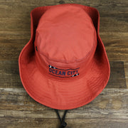 The New Jersey Ocean City Parallel Oars Cool Fit Boonie Hat | Nantucket Red Bucket Hat With the Sides Pinned up 