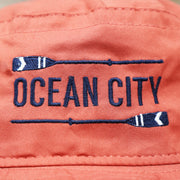 The Ocean City Oars Logo on the New Jersey Ocean City Parallel Oars Cool Fit Boonie Hat | Nantucket Red Bucket Hat
