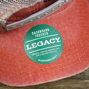 The Legacy Sticker on the OCNJ Block Ocean City Wordmark Mesh Trucker Hat | Nantucket Red Trucker Hat
