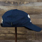 The wearer's right on the Ocean City New Jersey Wordmark Crossed Oars Logo Dad Hat | Navy Blue Dad Hat