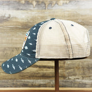 The wearer's left on the Ocean City Sunset Patch Fish Print Khaki Mesh Back Trucker Hat | Navy Blue Trucker Hat