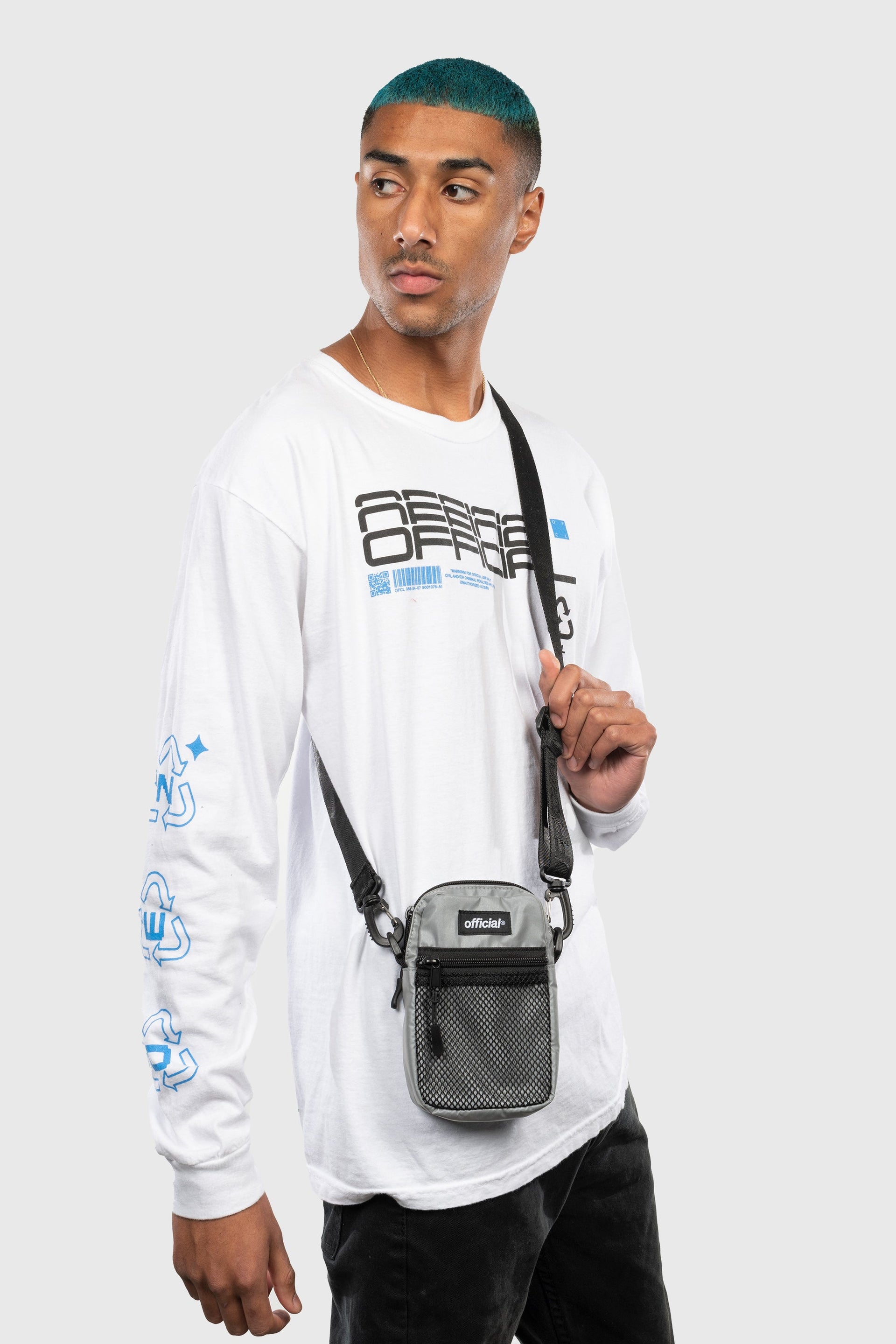 The Reflective 3M Essential Nylon Shoulder Bag Streetwear | Official Reflective Silver being worn