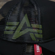 The Alpha Industries Flying A Mesh Print on the Philadelphia Phillies Alpha Industries Flying A Mesh Print 9Forty Trucker Hat With Flight Tag | Black Trucker Hat