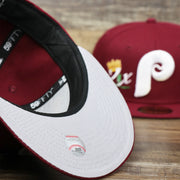 The undervisor on the Cooperstown Philadelphia Phillies Crown Champions Gray Bottom World Championship Wins Embroidered Fitted Cap | Maroon 59Fifty Cap