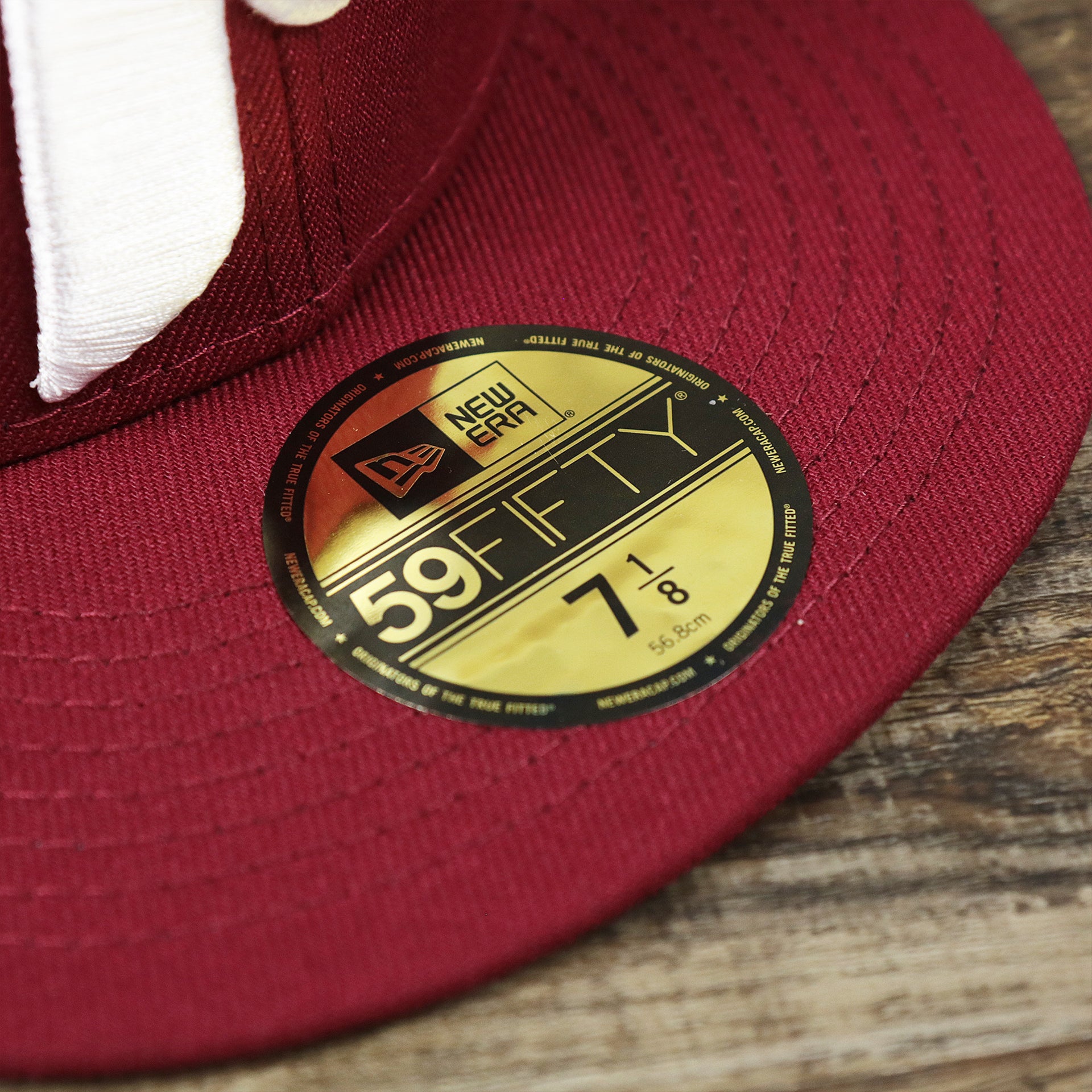 The 59Fifty Sticker on the Cooperstown Philadelphia Phillies Crown Champions Gray Bottom World Championship Wins Embroidered Fitted Cap | Maroon 59Fifty Cap