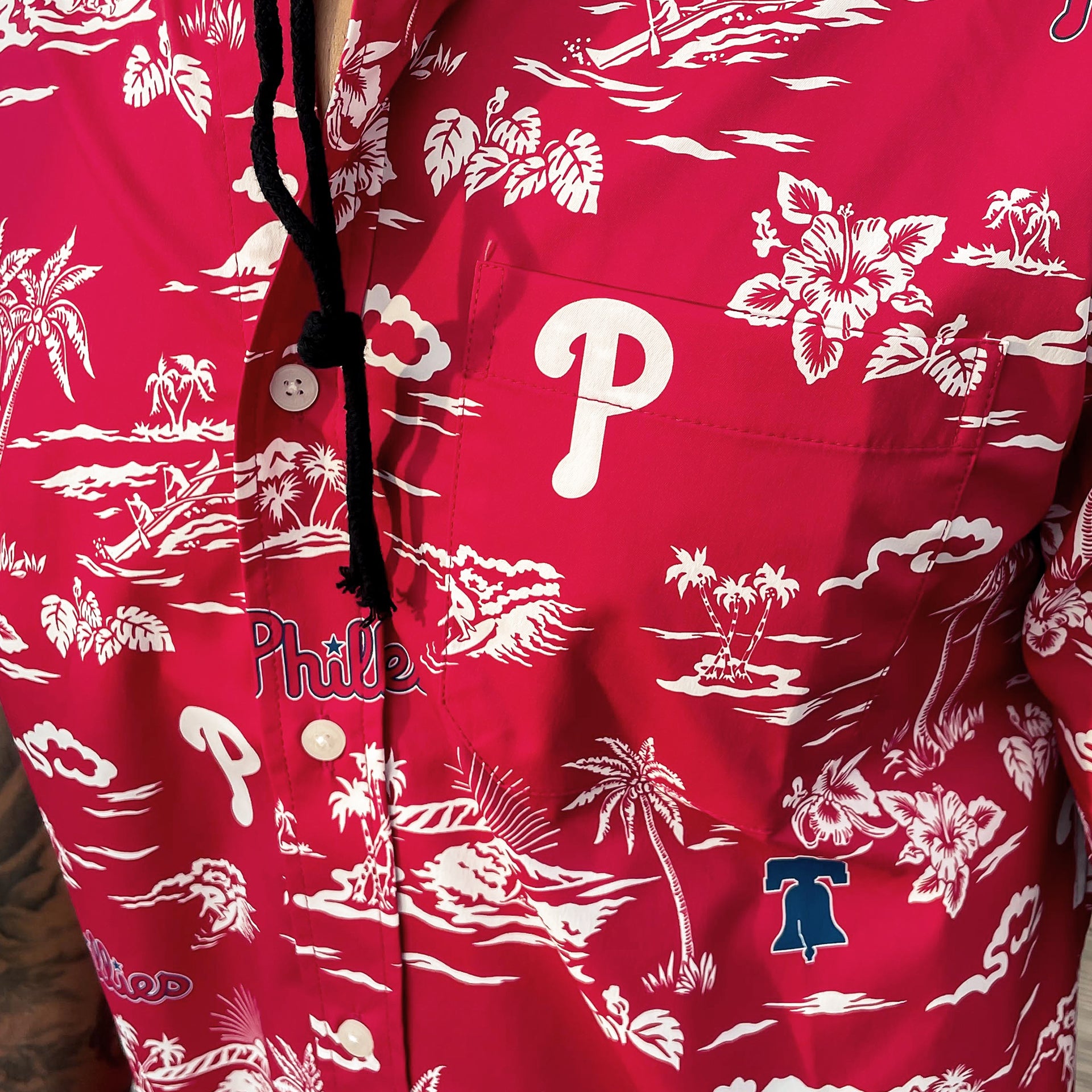 The Phillies print on the Philadelphia Phillies Authentic Hawaiian Print Performance Polo Shirt | Red