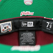 The Tags on the Cooperstown Philadelphia Phillies Wordmark Side Split Vintage Green Bottom With Phillies Embroidered Undervisor Fitted Cap | Maroon Blue 59Fifty Cap
