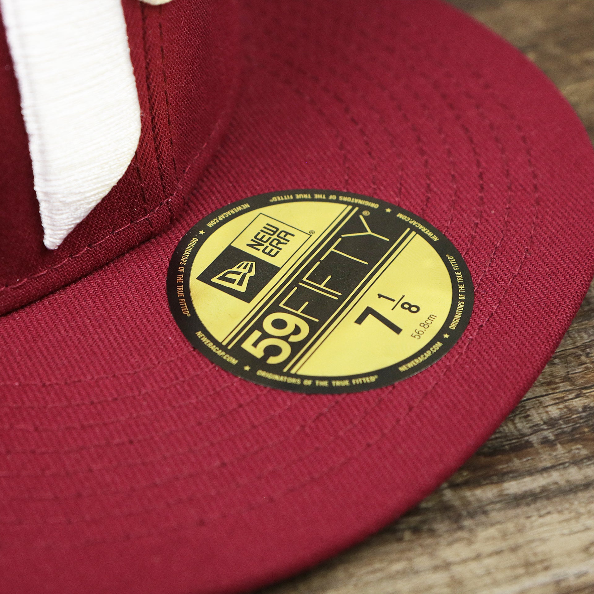 The 59Fifty Sticker on the Cooperstown Philadelphia Phillies Wordmark Side Split Vintage Green Bottom With Phillies Embroidered Undervisor Fitted Cap | Maroon Blue 59Fifty Cap