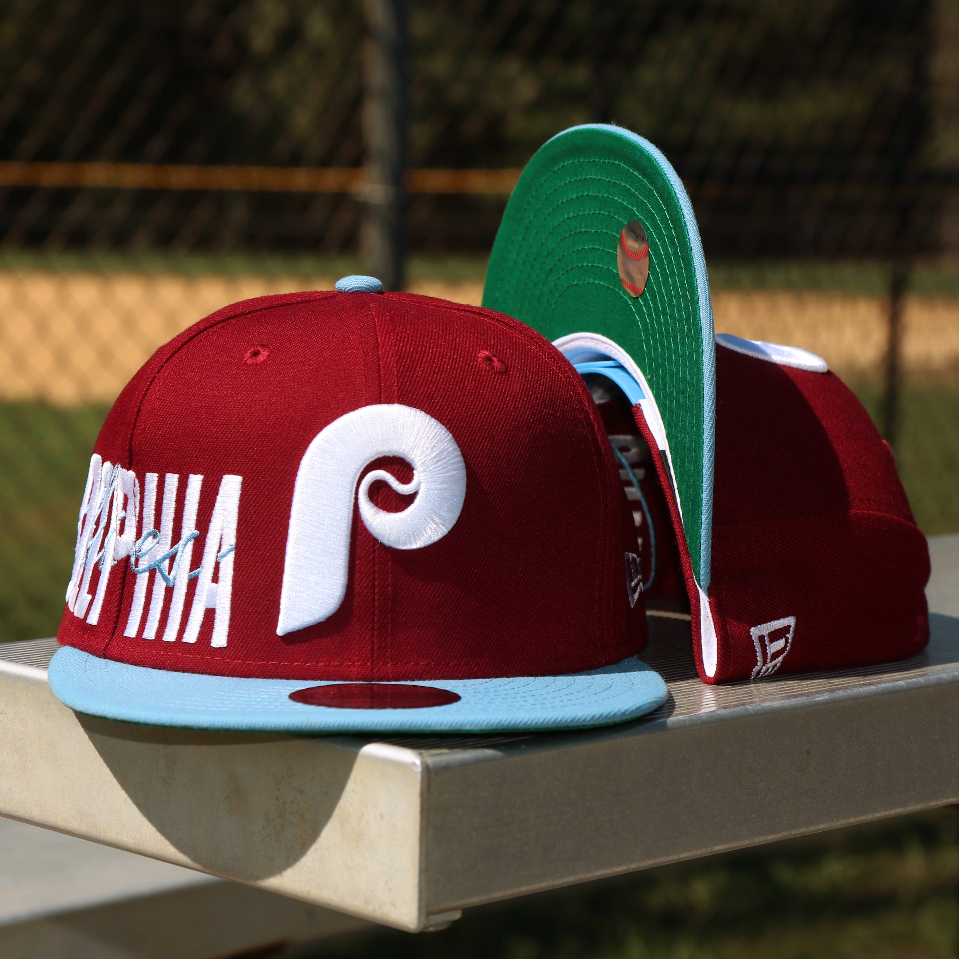 The front of the Cooperstown Philadelphia Phillies MLB Side Font Green Bottom 9Fifty Snapback Cap | Maroon Snap Cap