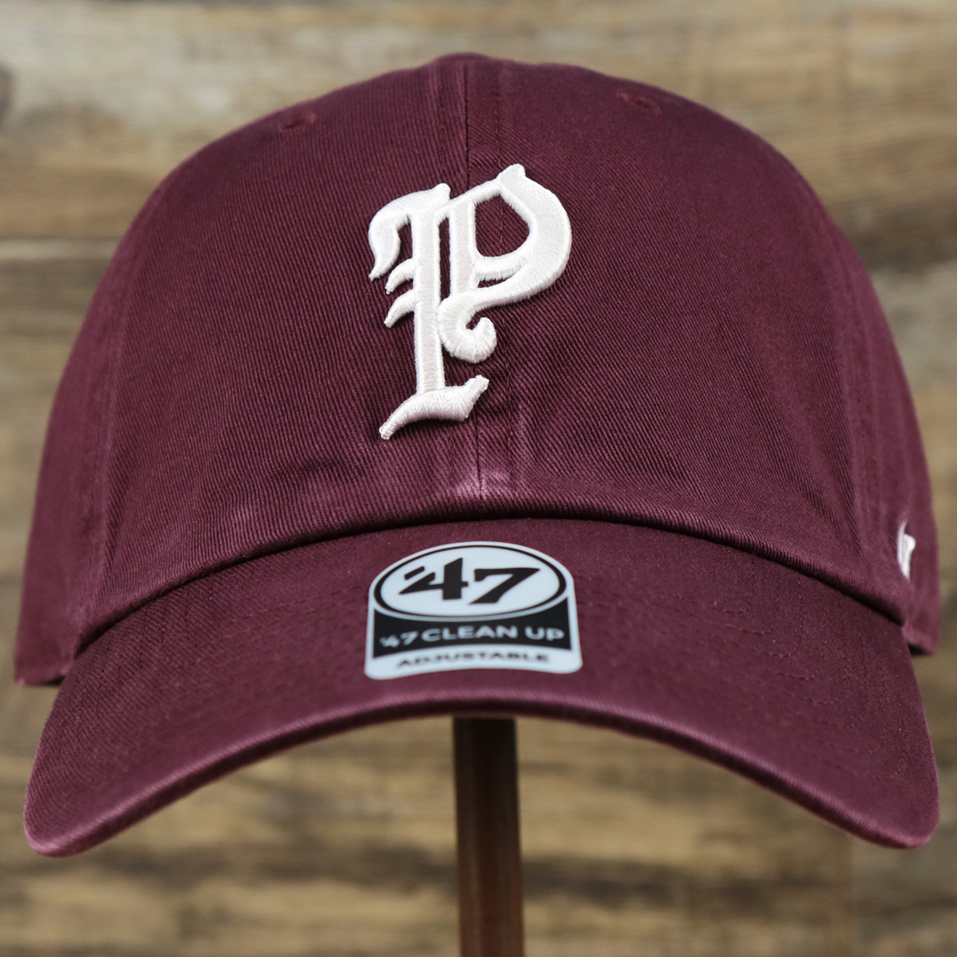 The front of the Cooperstown Philadelphia Phillies Vintage 1910s Phillies Logo Dad Hat | Dark Maroon Dad Hat