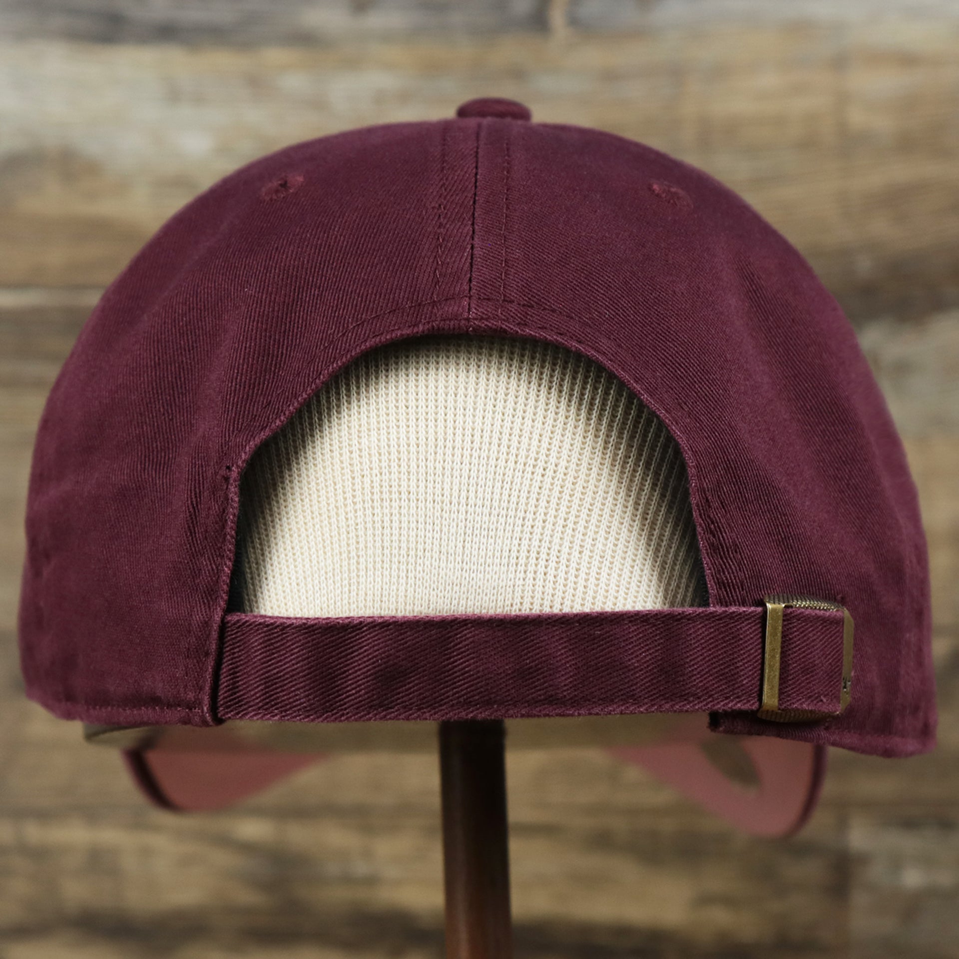 The backside of the Cooperstown Philadelphia Phillies Vintage 1910s Phillies Logo Dad Hat | Dark Maroon Dad Hat