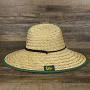 The wearer's left on the Green Bay Packers On Field 2020/2022 Summer Training Straw Hat | New Era OSFM
