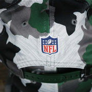The NFL Logo Patch on the back of the Green Bay Packers NFL OnField Summer Training 2022 Camo 9Fifty Snapback | Green Camo 9Fifty