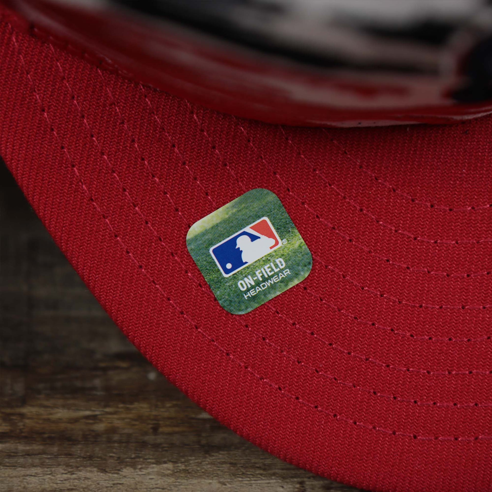 The On Field Sticker on the Philadelphia Phillies 2022 4th of July Stars And Stripes 9Fifty | New Era Red OSFM