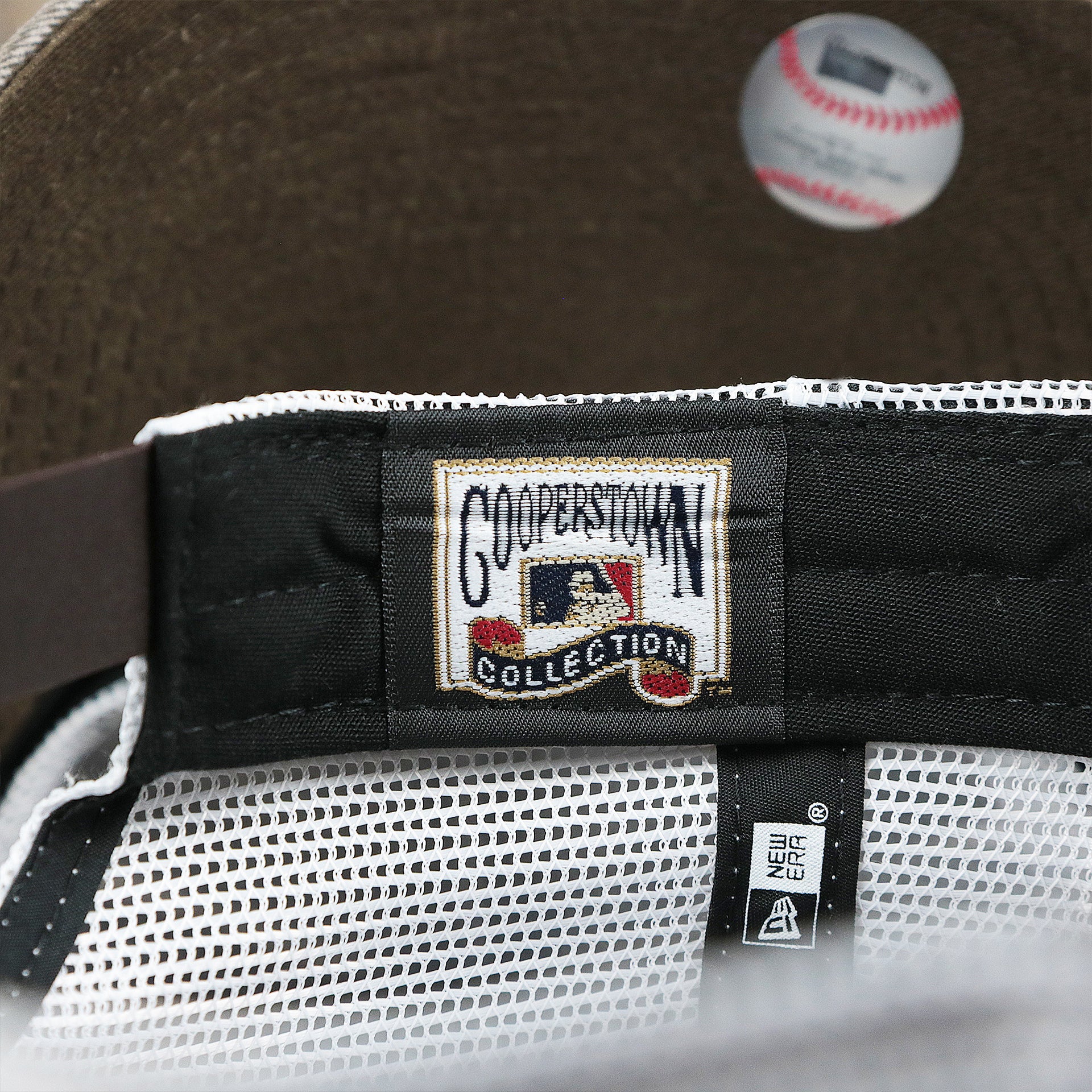 The Cooperstown Collection Tag on the Cooperstown San Diego Padres 1980s Logo Worn Colorway Mesh Back 9Forty Dad Hat | Brown 9Forty Hat