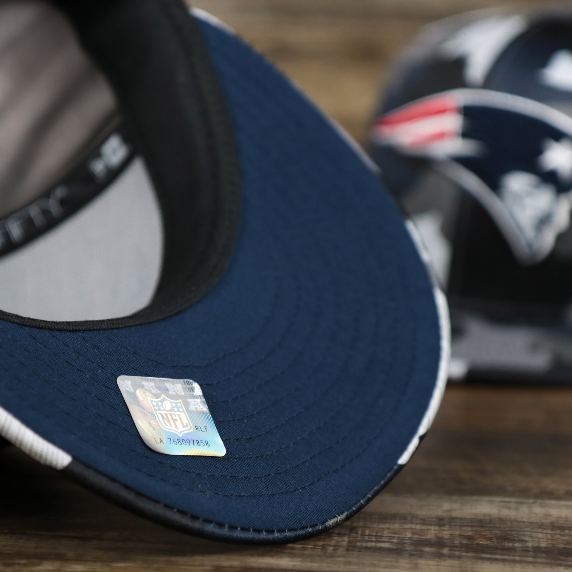 The Under Visor on the New England Patriots NFL OnField Summer Training 2022 Camo 9Fifty Snapback | Navy Blue Camo 9Fifty