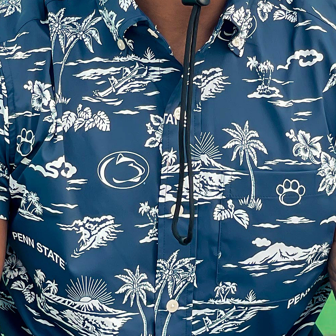 A close up of the front of the Penn State Nittany Lions Authentic Hawaiian Pattern Performance Polo Shirt | Navy