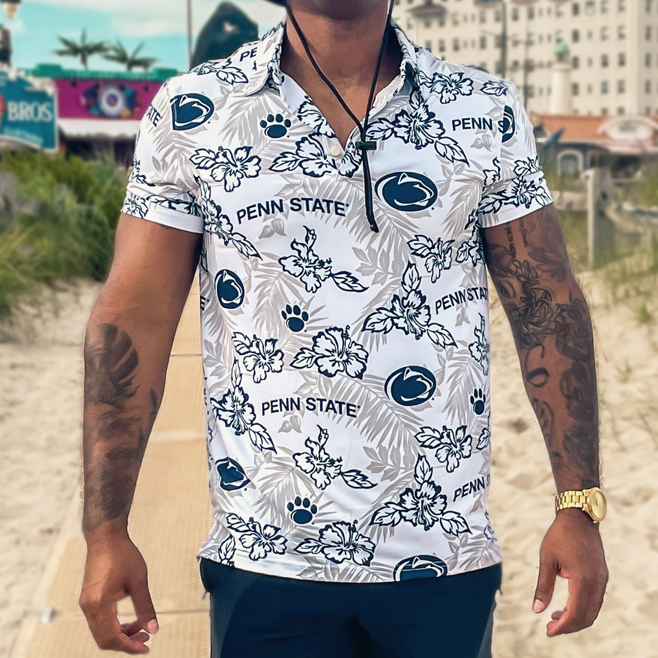 The front of the Penn State Nittany Lions Authentic Hawaiian Pattern Performance Polo Shirt | Navy