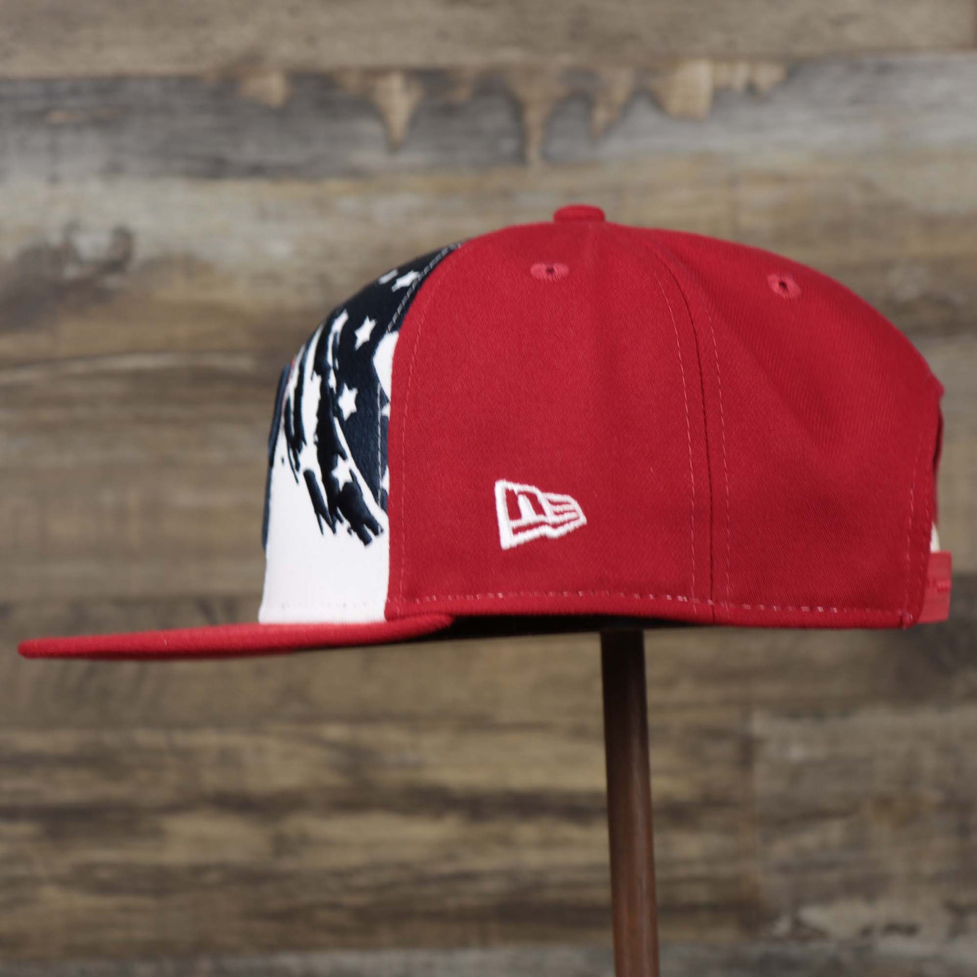 The wearer's left on the Philadelphia Phillies 2022 4th of July Stars And Stripes 9Fifty | New Era Red OSFM
