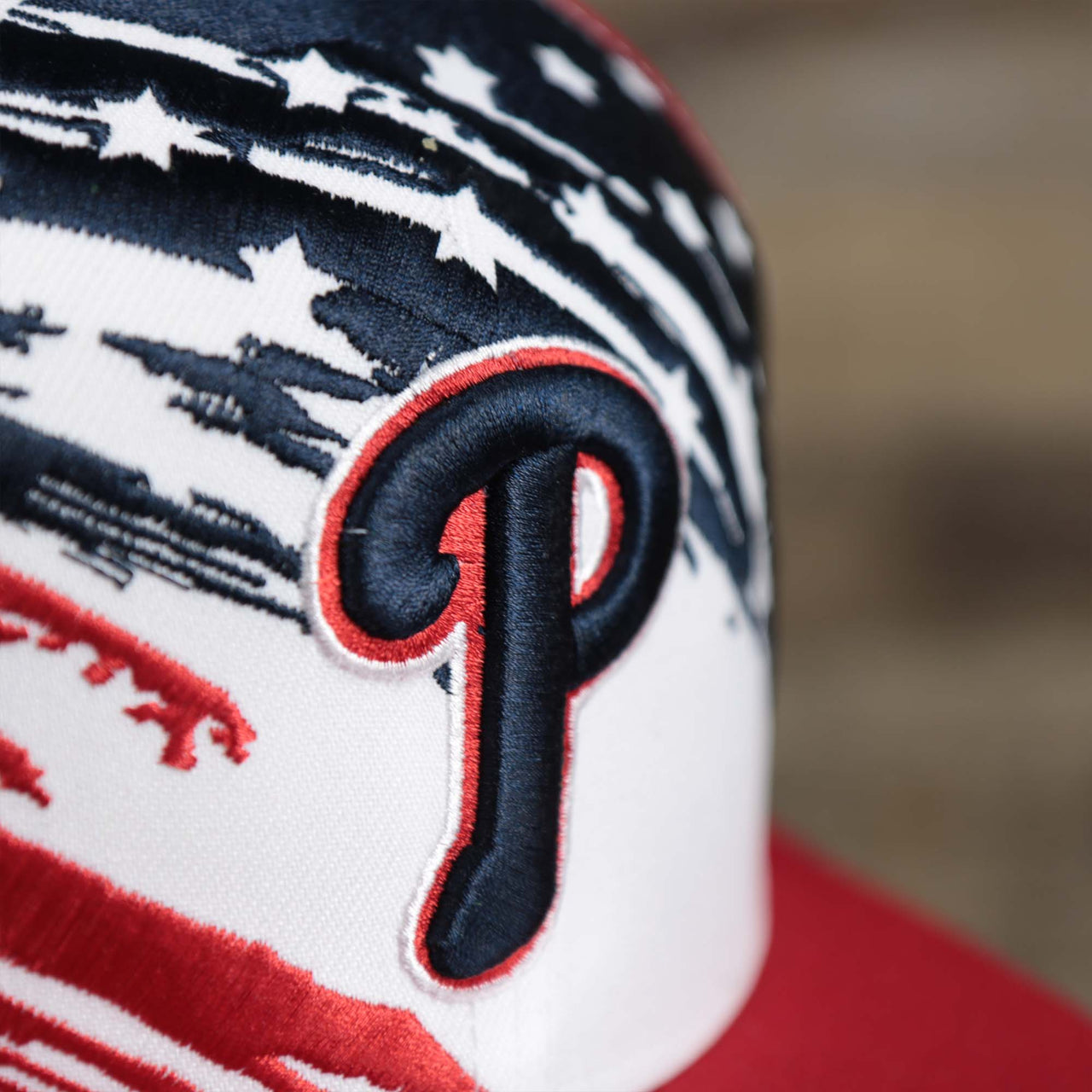 The Phillies Logo on the Philadelphia Phillies 2022 4th of July Stars And Stripes 9Fifty | New Era Red OSFM