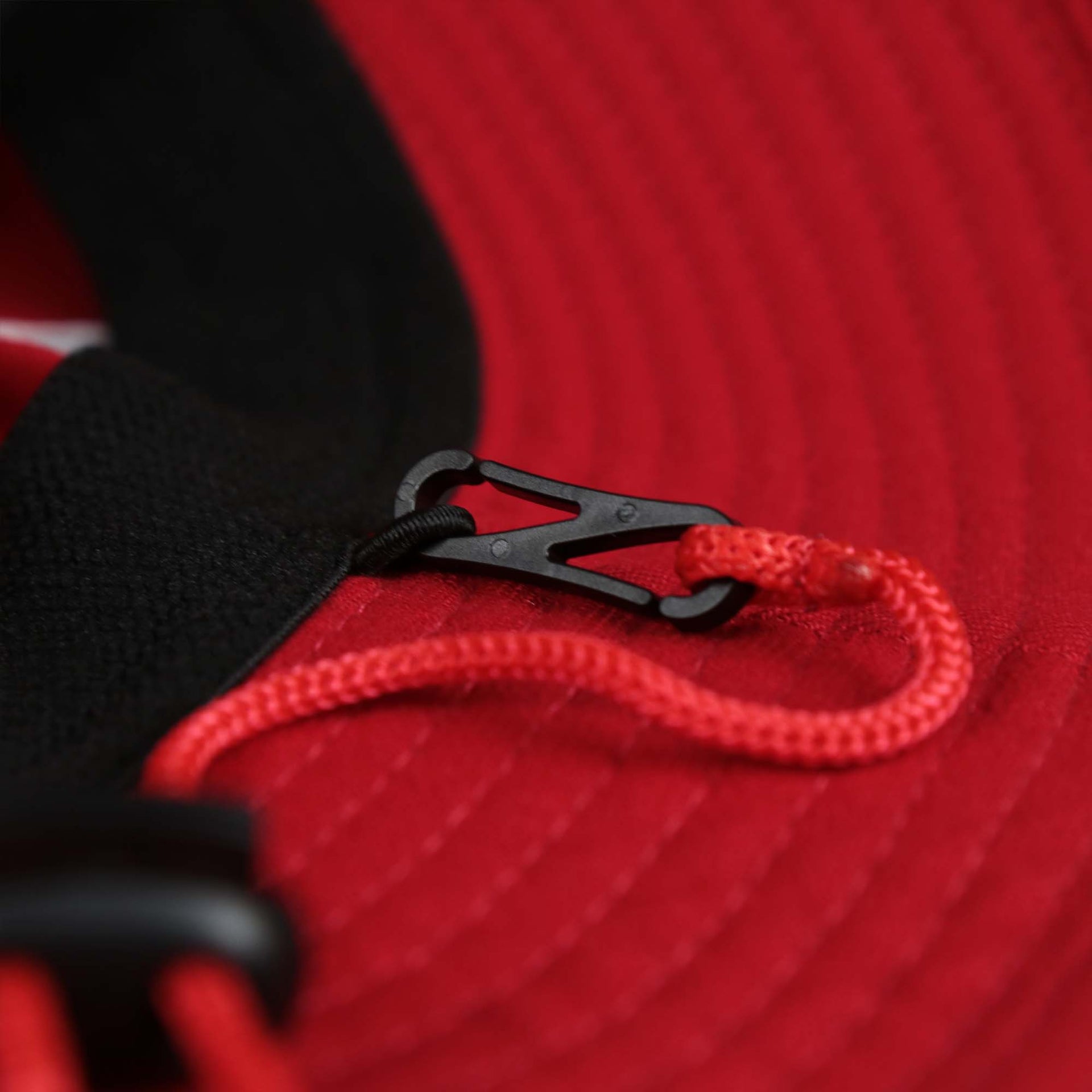 The detachable chin strap on the Stars And Stripes Philadelphia Phillies 4th of July Bucket Hat | New Era Red OSFM
