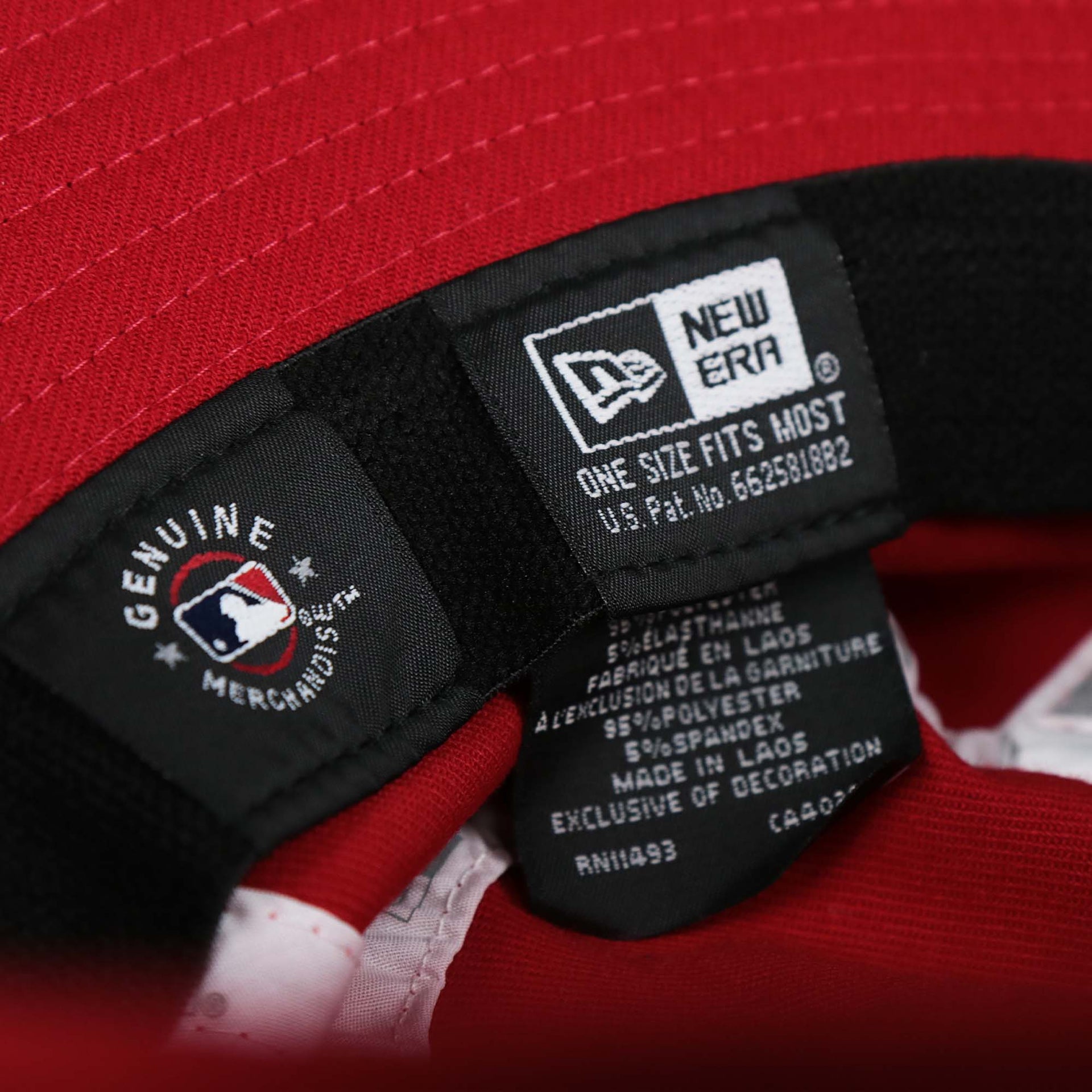The Genuine MLB Merchandise Tag and the New Era Tag on the Stars And Stripes Philadelphia Phillies 4th of July Bucket Hat | New Era Red OSFM