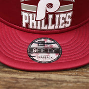 The 9Fifty Sticker on the Cooperstown Philadelphia Phillies Trucker Gray Bottom 9Fifty Snapback | Red Trucker Snapback