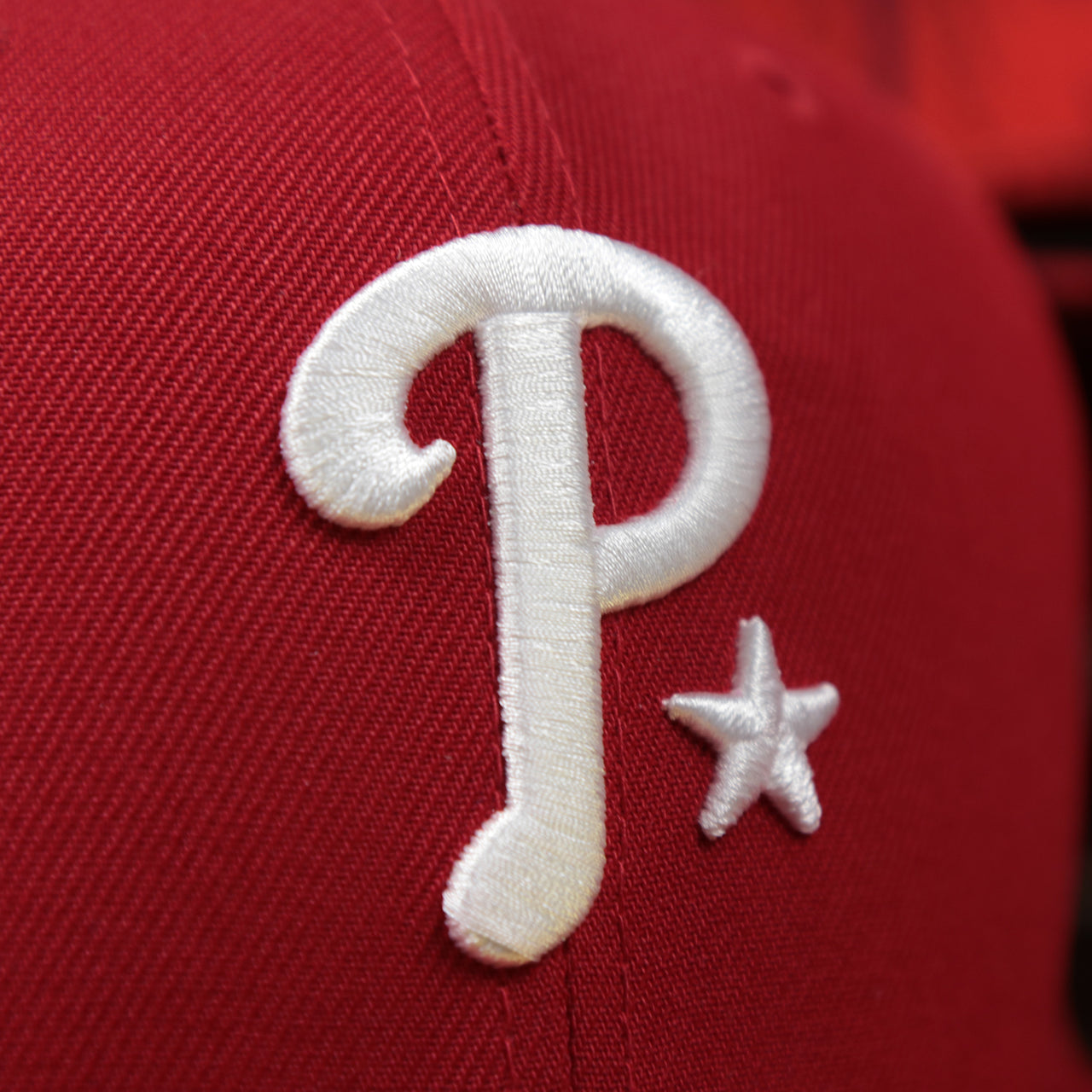 The Phillies Logo on the Philadelphia Phillies Metallic All Star Game MLB 2022 Side Patch 59Fifty Mesh Fitted Cap | ASG 2022 Red 59Fifty Cap