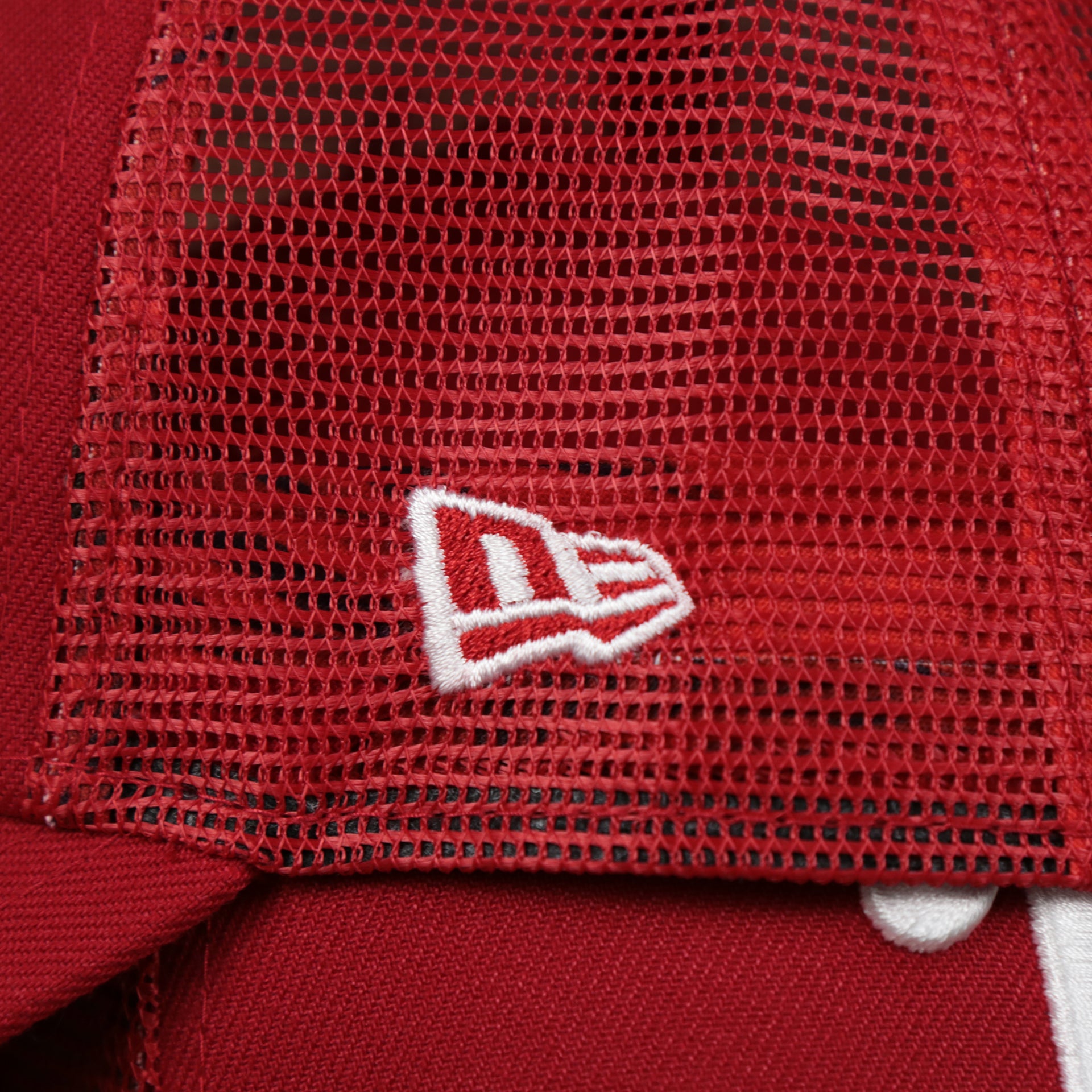 The New Era Logo on the Philadelphia Phillies Metallic All Star Game MLB 2022 Side Patch 9Forty Mesh Trucker | ASG 2022 Red Trucker Hat