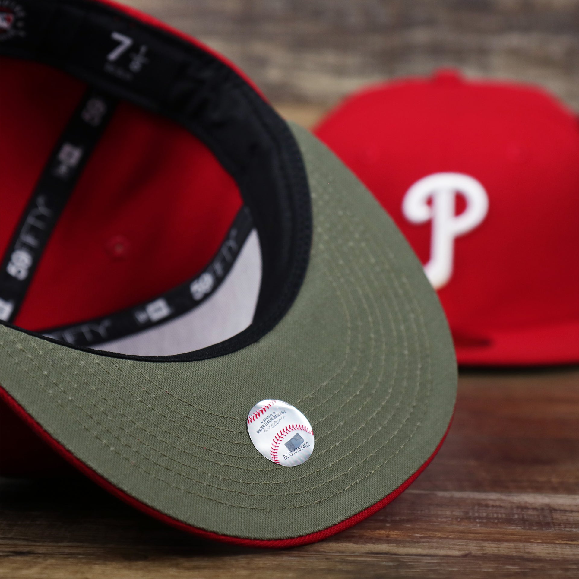 The undervisor on the Philadelphia Phillies Alpha Industries Side Patch Army Green Undervisor 59FIfty Fitted Cap With Hangtag | Red 59FIfty Cap