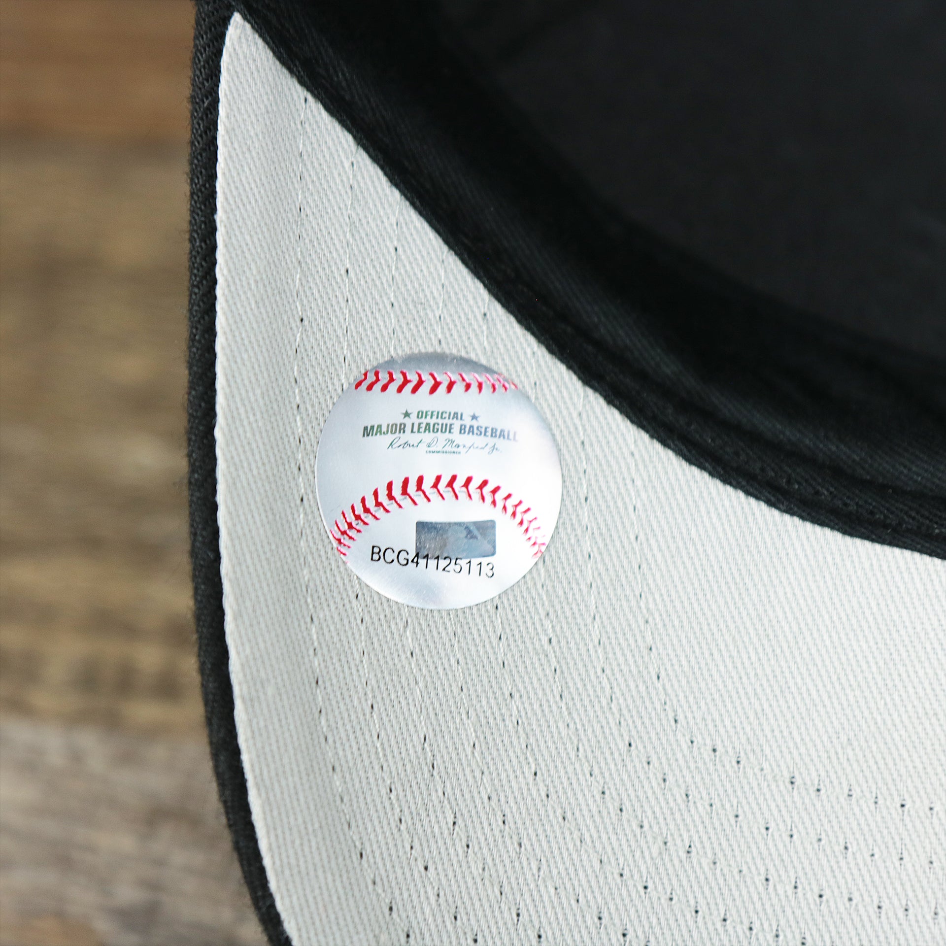 The MLB Baseball Sticker on the Philadelphia Phillies Gray Logo Gray Bottom Wool Dad Hat | Black Wool Dad Hat