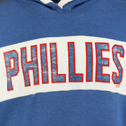 phillies wordmark on the Distressed Philadelphia Phillies Wordmark Pull Over Hoodie With Phillies Logo | Cadet Blue Pullover Hoodie