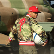 The backside of the liner on the Philadelphia Phillies MLB Patch Alpha Industries Reversible Bomber Jacket With Camo Liner | Red Bomber Jacket