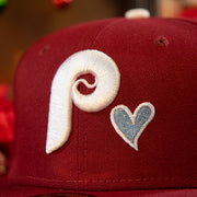 phillies and heart logo on the Philadelphia Phillies Heart Patch 1980 World Series Icy Blue Bottom Brim Fitted | Phillies Maroon Icy Blue Underbrim Side Patch 59Fifty Hat