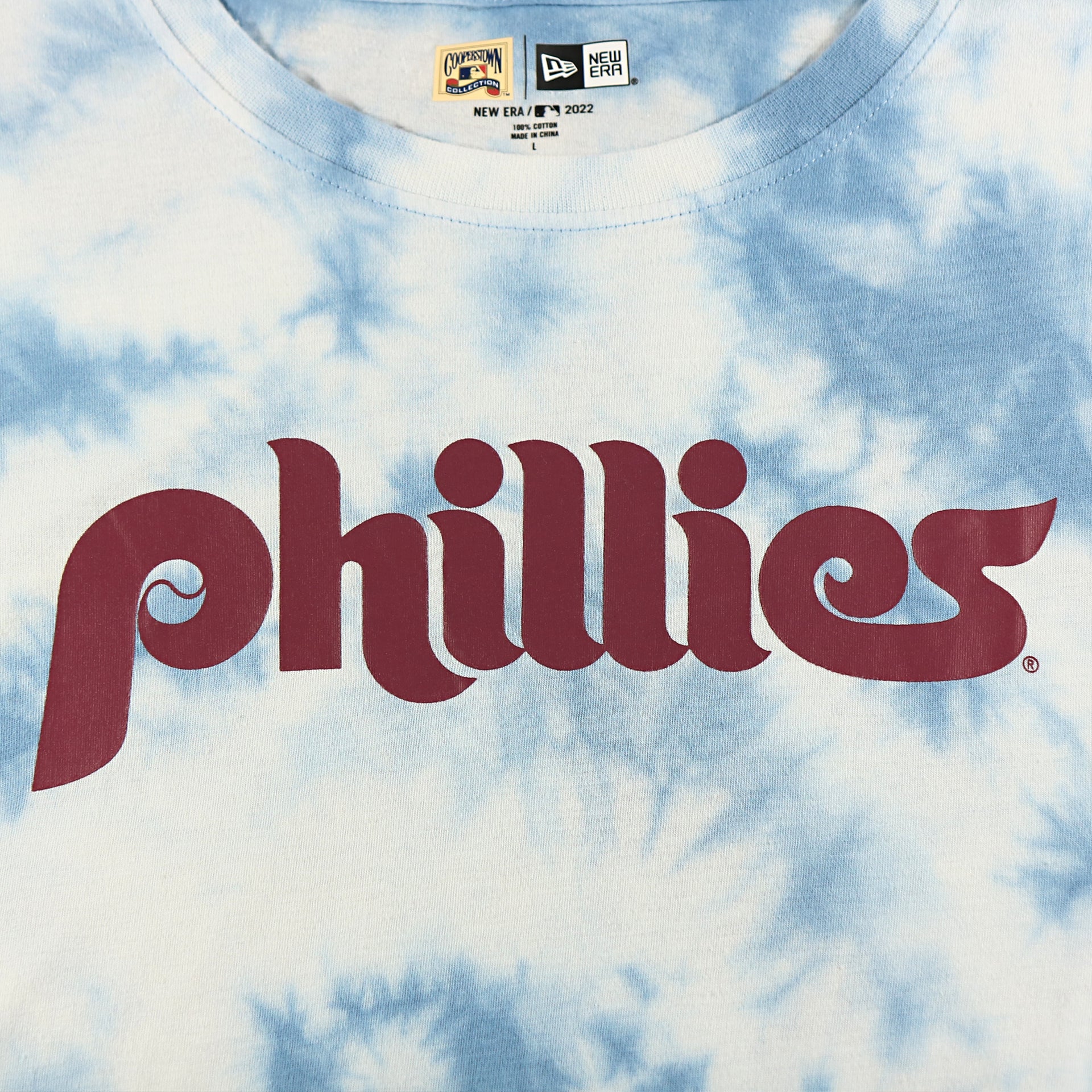 word mark logo on the Philadelphia Phillies Vintage Phillies Wordmark Tie-Dye MLB T-Shirt | Columbia Blue Tie-Dye T-shirt