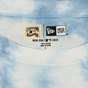 new era tag on the Philadelphia Phillies Vintage Phillies Wordmark Tie-Dye MLB T-Shirt | Columbia Blue Tie-Dye T-shirt