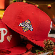 2008 world series patch on the Philadelphia Phillies 2008 World Series Pink Heart Patch 59fifty Pink Brim Fitted Hat | Red