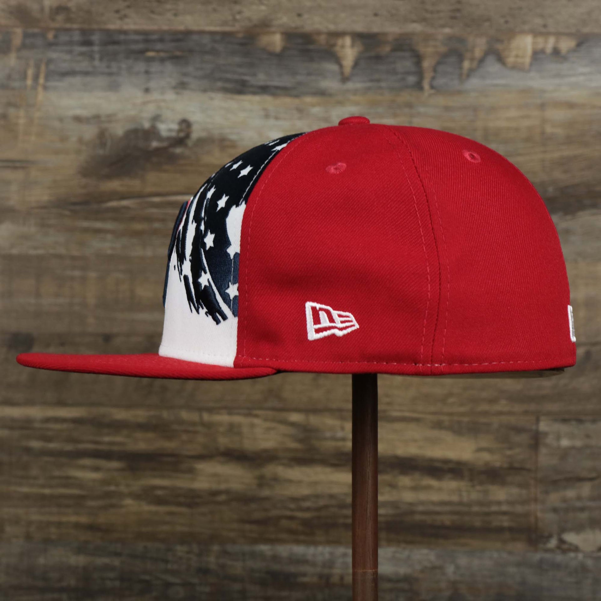 The wearer's left on the Stars And Stripes Philadelphia Phillies 4th of July 59Fifty | New Era Red OSFM