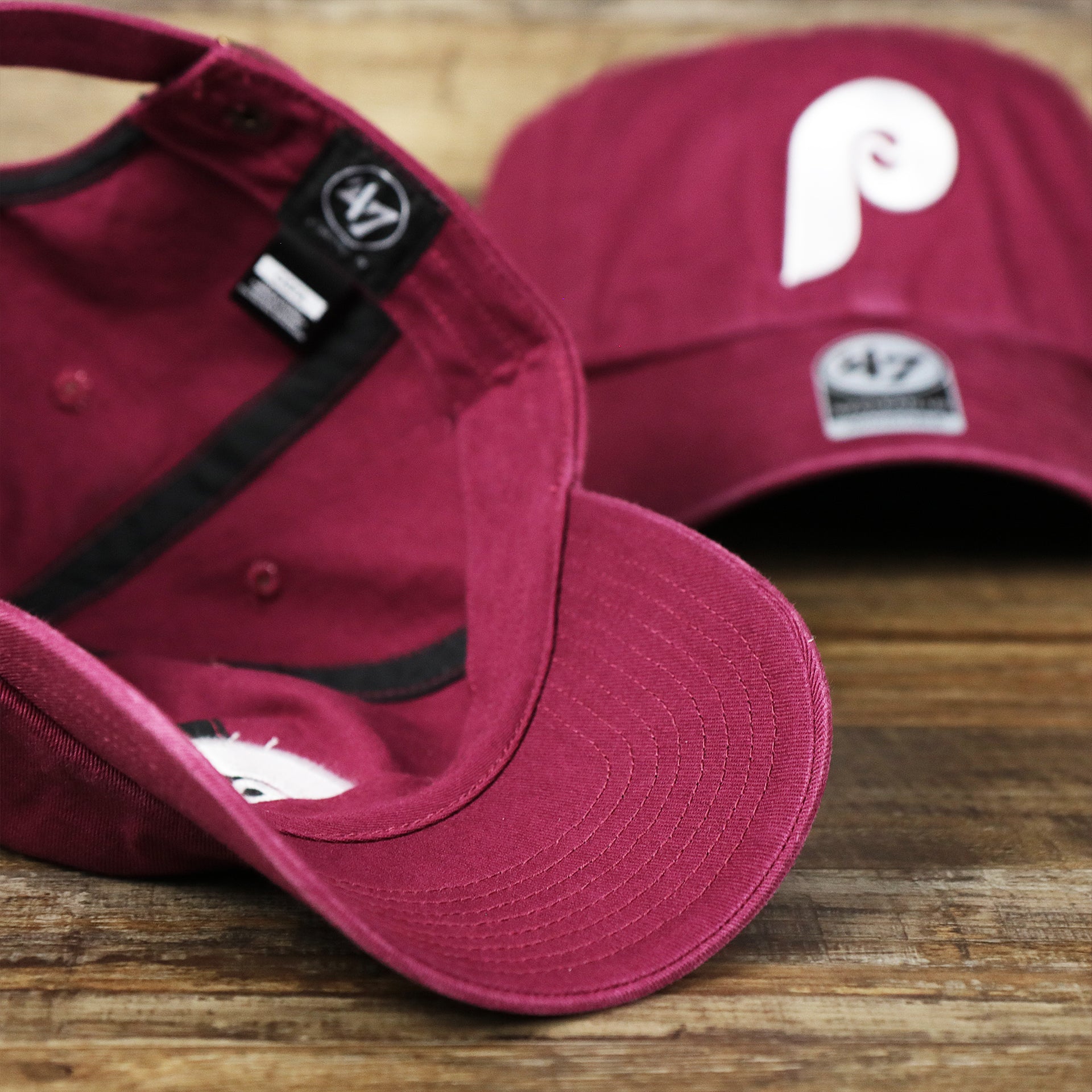 The undervisor on the Cooperstown Philadelphia Phillies White Cooperstown Logo Dad Hat | Cardinal Dad Hat