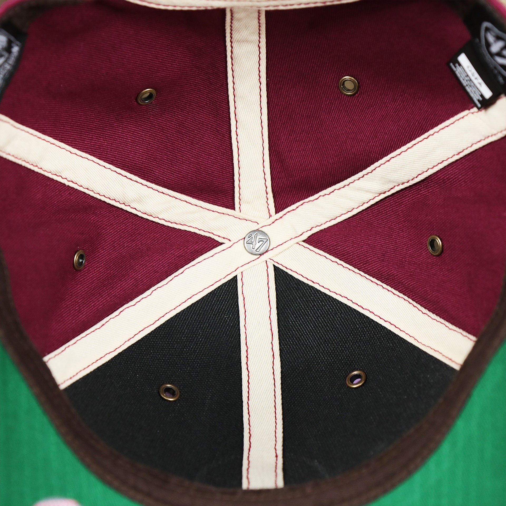 The inside of the Cooperstown Philadelphia Phillies Felt Phillies Logo Snapback Hat | Cardinal Snapback Cap