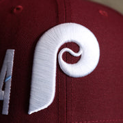 The Cooperstown Phillies Logo on the Cooperstown Philadelphia Phillies MLB Side Font Green Bottom 9Fifty Snapback Cap | Maroon Snap Cap
