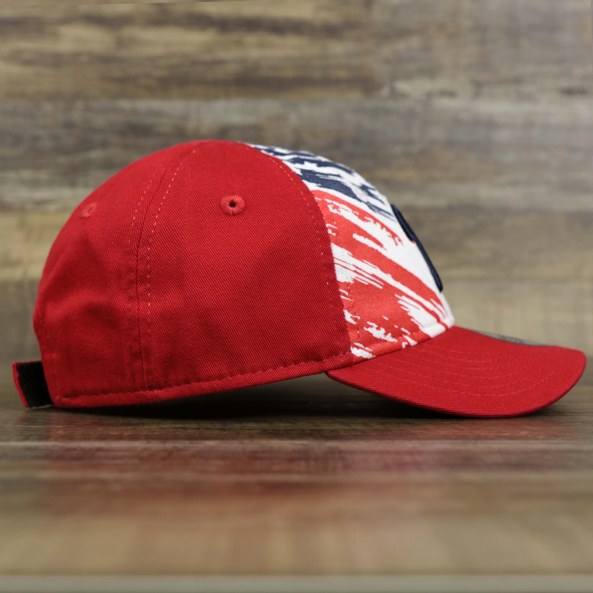 The wearer's right on the Toddler Stars And Stripes Philadelphia Phillies 4th of July 9Twenty | New Era Red OSFM