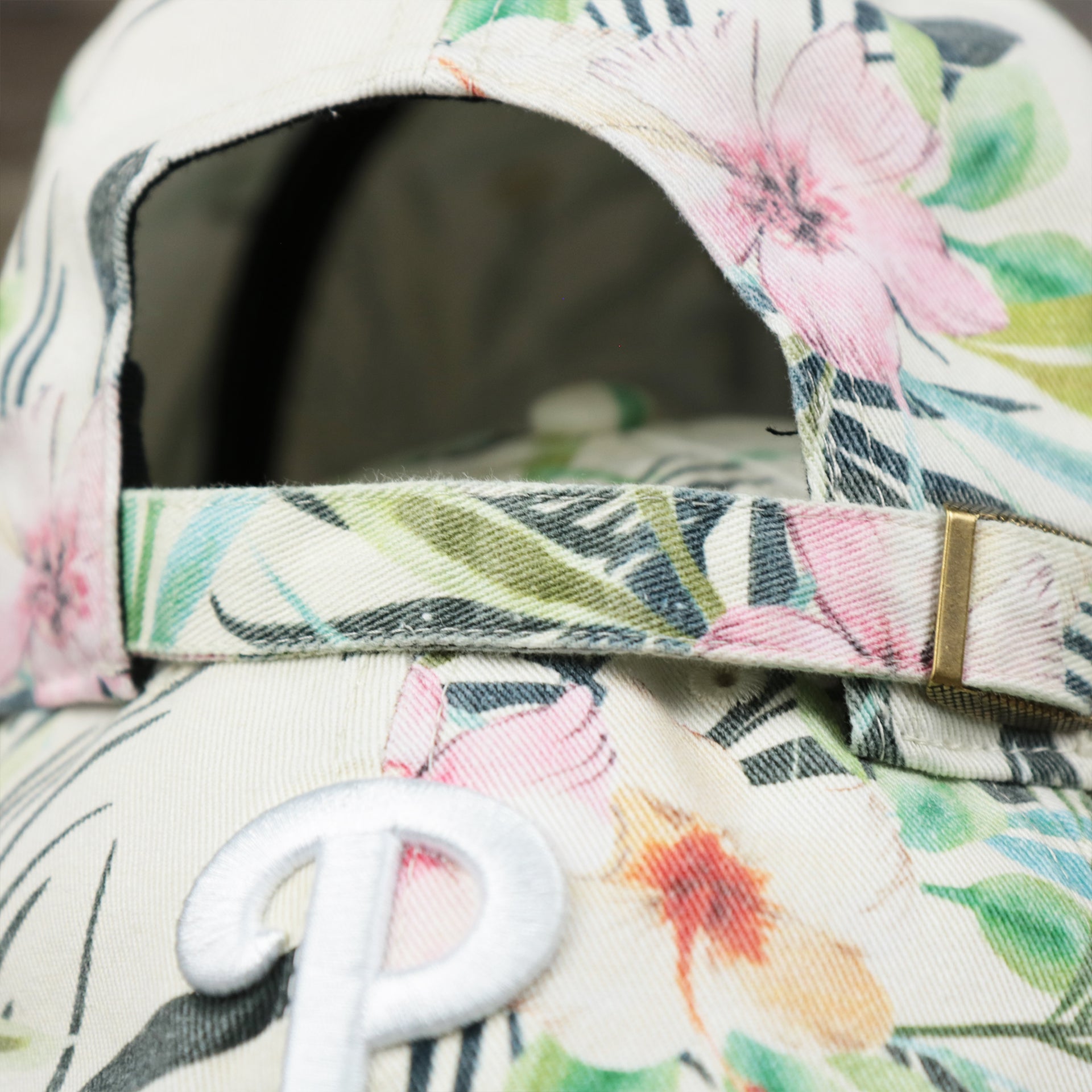 The Floral Print Adjustable Strap on the Women’s Philadelphia Phillies Floral Print Gray Bottom Dad Hat | White Dad Hat