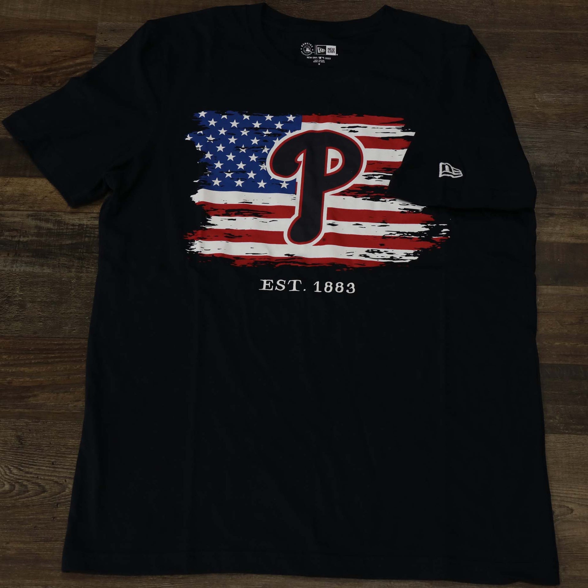 The sleeves on the Philadelphia Phillies 2022 4th of July Stars and Stripes T-Shirt | New Era Navy
