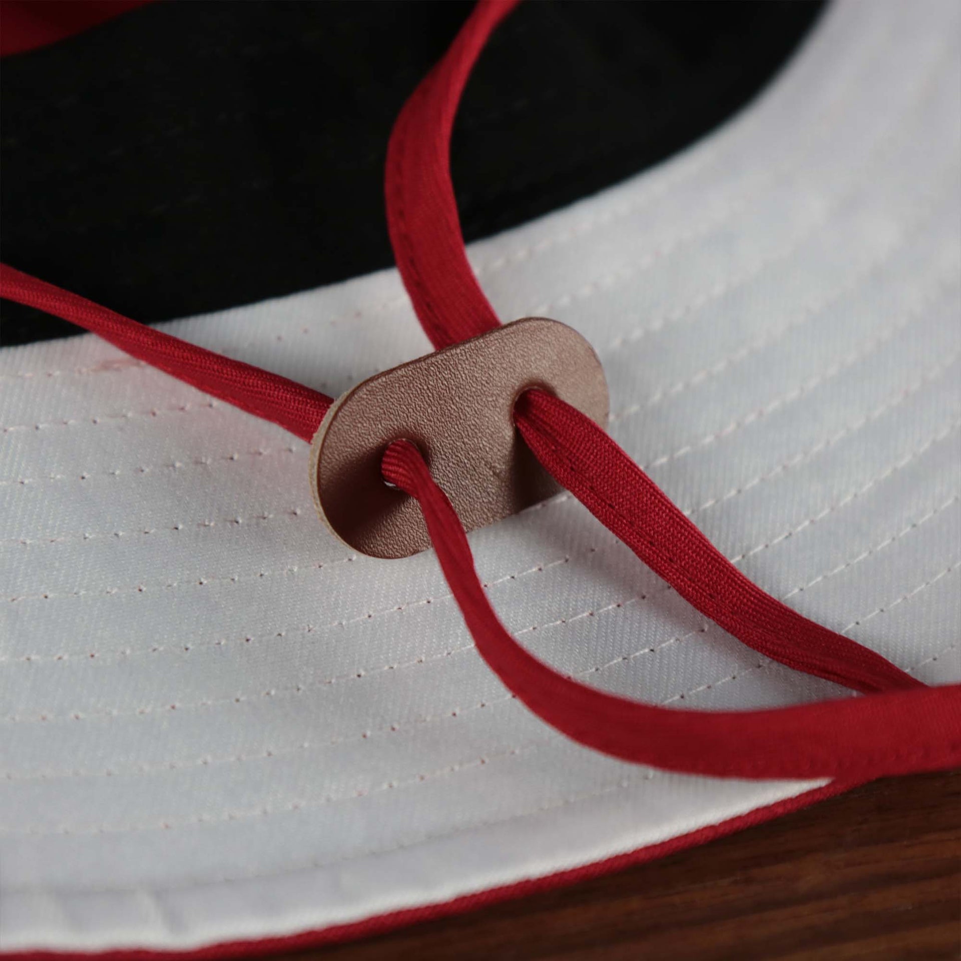 The chin strap on the Philadelphia Phillies Panama Pail Fightin Phils Bucket Hat | 47 Brand, Red
