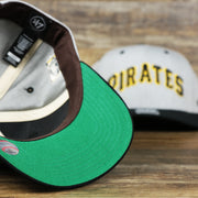 The Green Undervisor on the Cooperstown Pittsburgh Pirates Wordmark Green Bottom 1980s Logo Pirates Side Patch Dad Hat | Gray Dad Hat