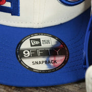 The 9Fifty Sticker on the Detroit Pistons NBA 2022 Draft Gray Bottom 9Fifty Snapback | New Era Cream/Royal Blue
