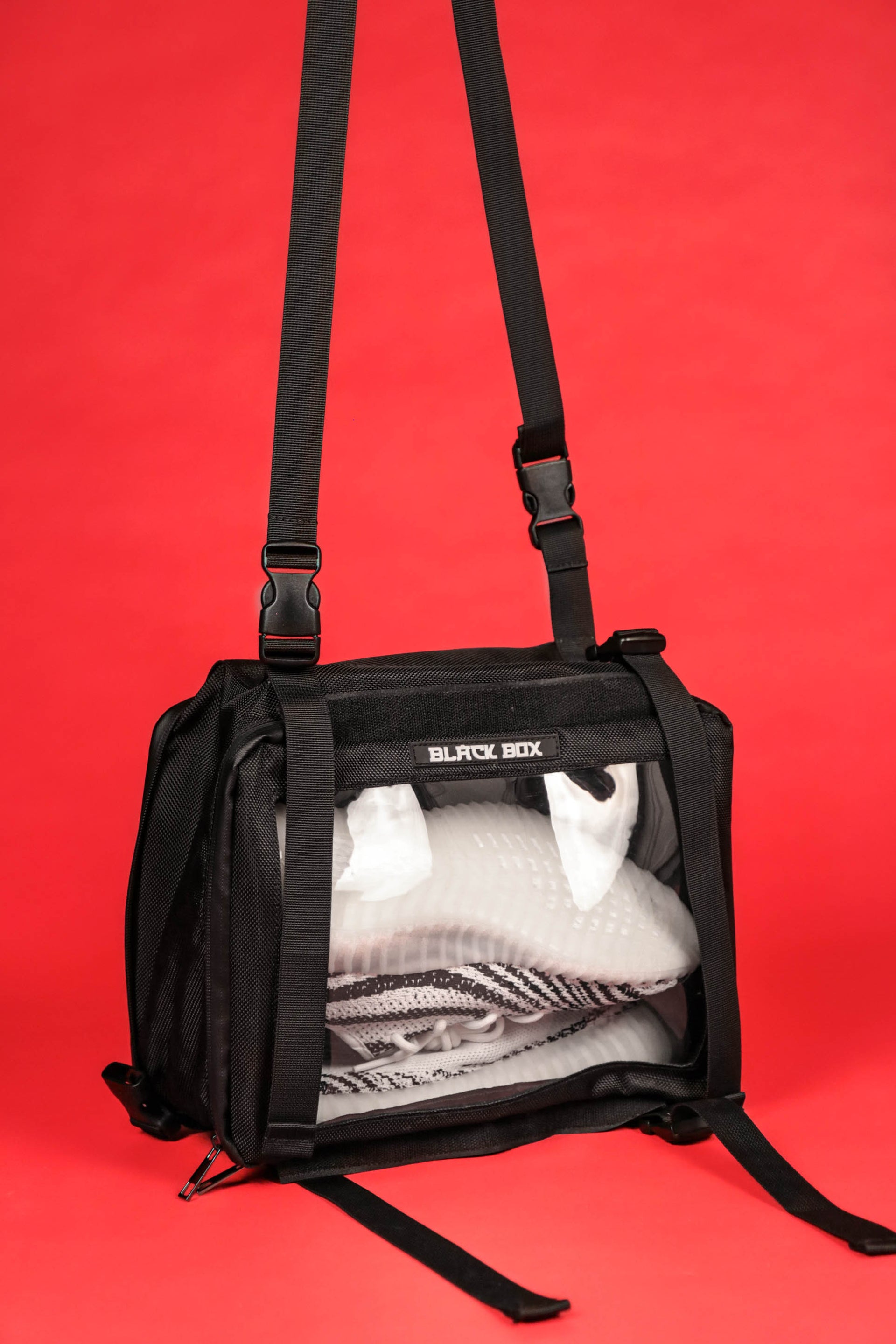 The shoulder strap on the Black Box Portable Hanging Sneaker Bag For Travel and Storage With Clear Window