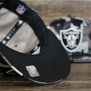 The undervisor on the Los Angeles Raiders NFL OnField Summer Training 2022 Camo 9Fifty Snapback | Black Camo 9Fifty